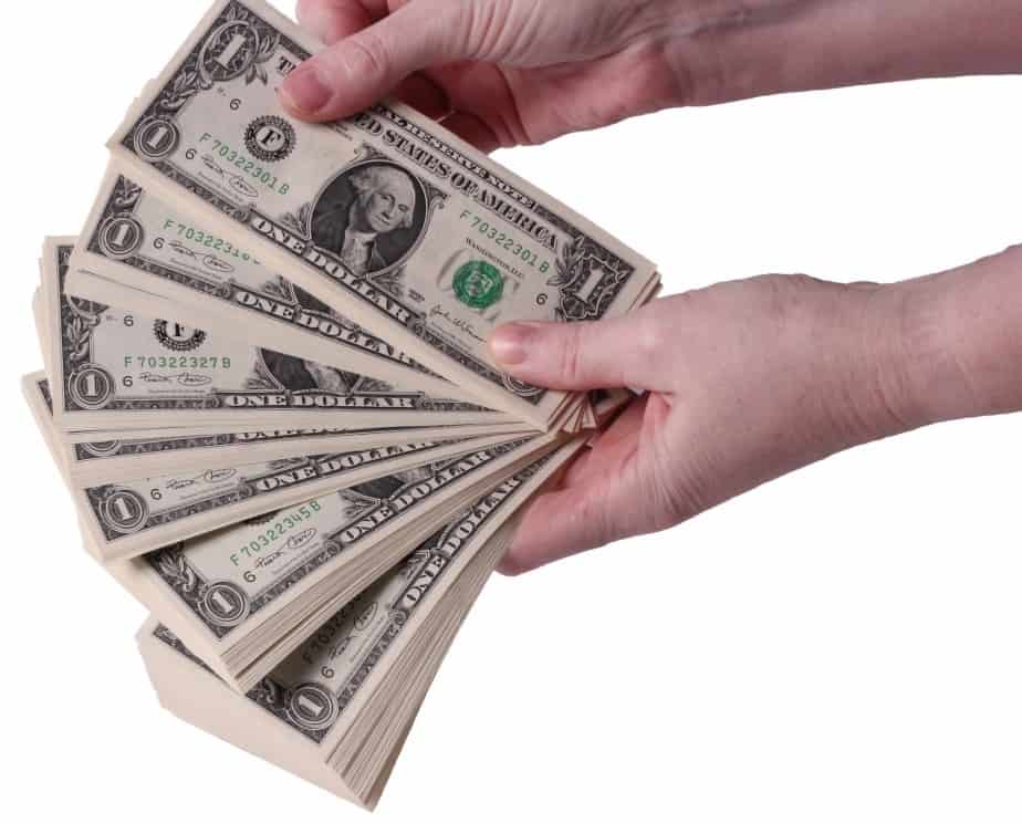 hands holding money